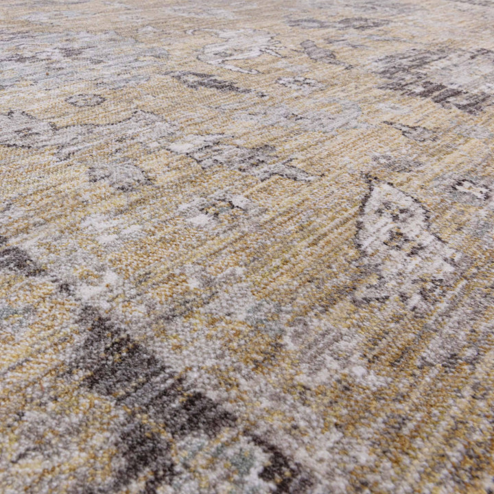 Tappeto Jasper medaglione floreale giallo oro e