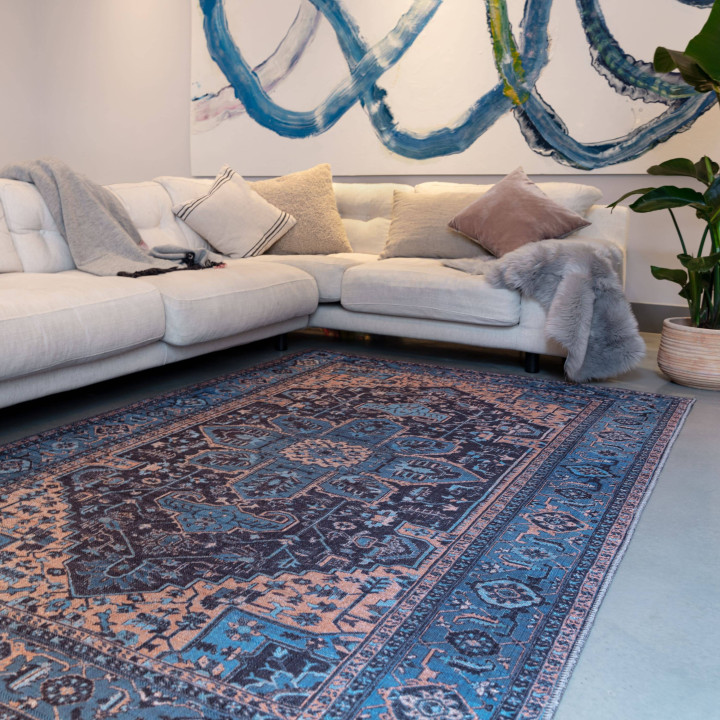 Tappeto Kaya medaglione floreale blu e arancione
