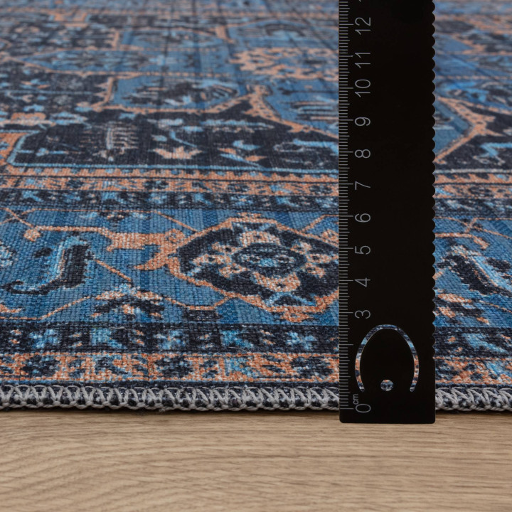Tappeto Kaya medaglione floreale blu e arancione