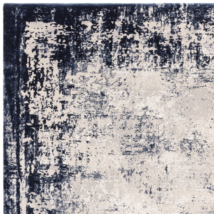 Tappeto Kuza astratto blu scuro e grigio chiaro
