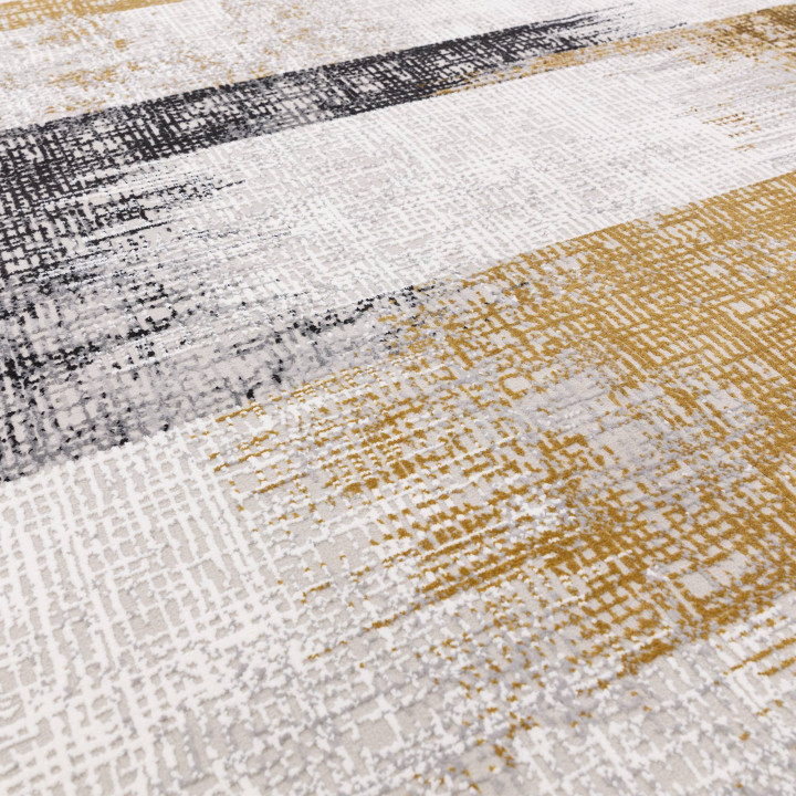 Tappeto Kuza astratto giallo oro e grigio scuro