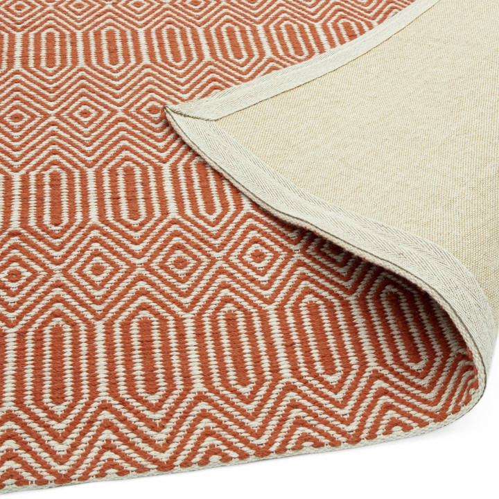 Tappeto Sloan geometrico arancione e bianco 120x