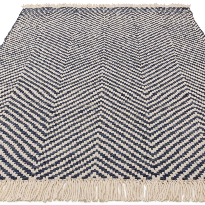 Tappeto Vigo geometrico blu scuro e bianco crema